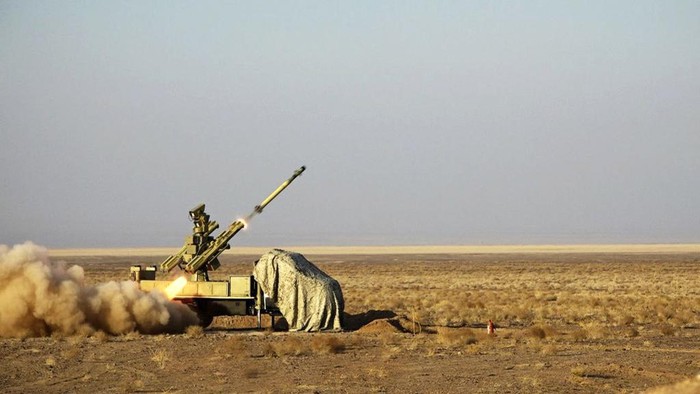 In this photo provided Sunday, Jan. 12, 2025, by the Iranian Army, a missile is launched during a drill in Iran. (Iranian Army via AP)