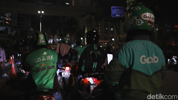 Infografis Pesaing Gojek dan Grab