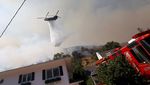 Pesawat-Helikopter Dikerahkan untuk Padamkan Kebakaran Hutan Los Angeles