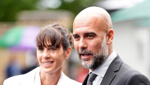 Manchester City manager Pep Guardiola with his wife Cristina Serra on day six of the 2024 Wimbledon Championships at the All England Lawn Tennis and Croquet Club, London. Picture date: Saturday July 6, 2024. (Photo by John Walton/PA Images via Getty Images)