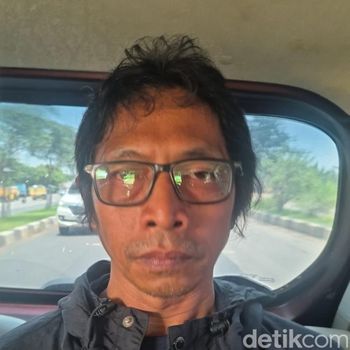 Tampang Nanang 'Gimbal' pembunuh Sandy Permana ditangkap polisi.