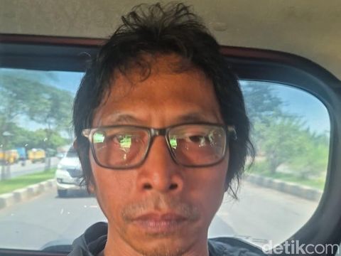 Tampang Nanang 'Gimbal' pembunuh Sandy Permana ditangkap polisi.