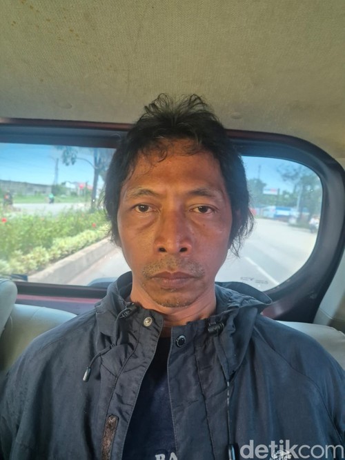 Tampang pembunuh Sandy Permana usai ditangkap di Karawang
