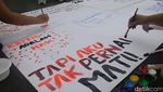 Potret 18 Tahun Aksi Kamisan di Seberang Istana