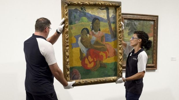 Lukisan When Will You Marry? karya Paul Gauguin. (DANI POZO / AFP)