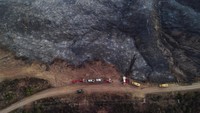 Pemandangan drone menunjukkan bekas kebakaran Palisades Fire di dekat Mulholland Drive di Los Angeles, California, Rabu (15/1/2025).