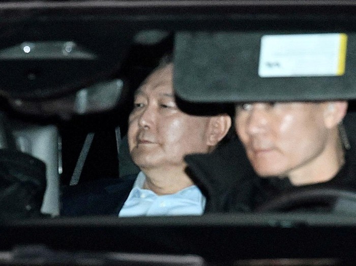 A motorcade carrying South Koreas impeached President Yoon Suk Yeol leaves for Seoul Detention Center at the Corruption Investigation Office for High-ranking Officials (CIO) following his arrest, in Gwacheon, South Korea, January 15, 2025.   Yonhap via REUTERS   THIS IMAGE HAS BEEN SUPPLIED BY A THIRD PARTY. NO RESALES. NO ARCHIVES. SOUTH KOREA OUT. NO COMMERCIAL OR EDITORIAL SALES IN SOUTH KOREA.     TPX IMAGES OF THE DAY