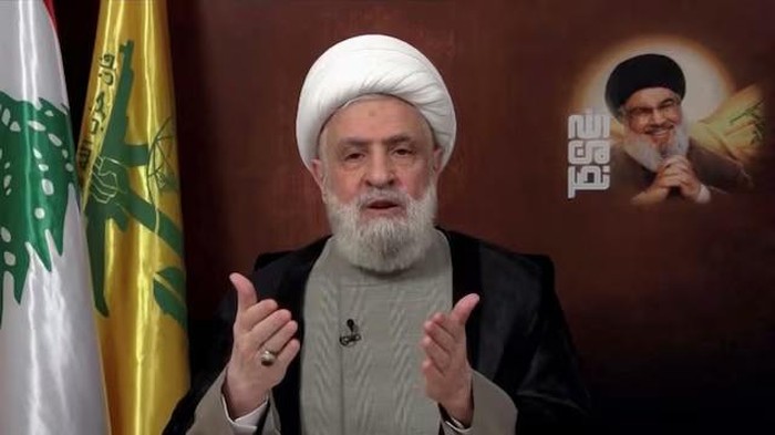 Lebanons Hezbollah leader Sheikh Naim Qassem delivers an address from an unknown location, November 29, 2024, in this still image from video. Al Manar TV/Reuters TV via REUTERS/File Photo Purchase Licensing Rights