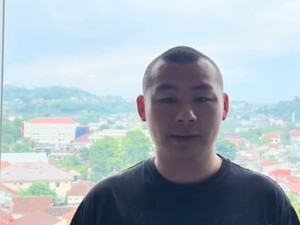 WN China yang Unggah Video Selipkan Uang di Paspor Minta Maaf