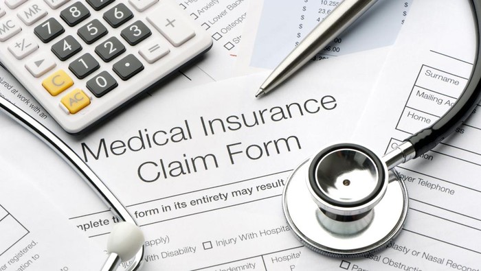 Close up of a medical insurance form with stethoscope