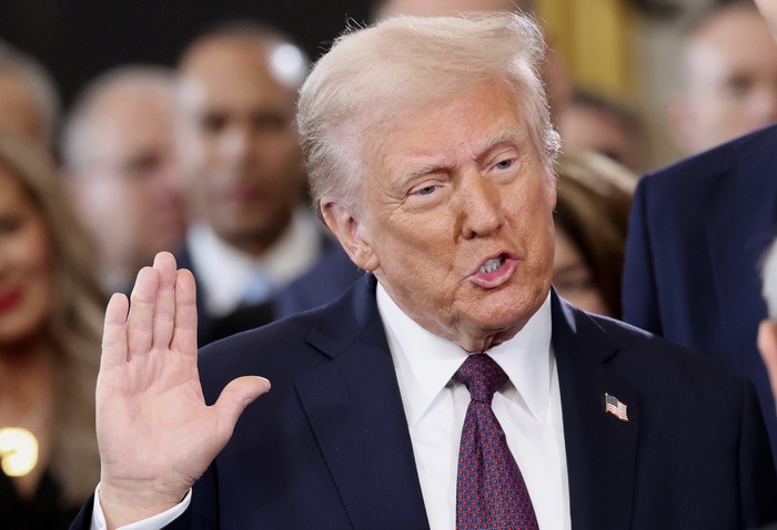 President-elect Donald Trump takes the oath of office during the 60th Presidential Inauguration in the Rotunda of the U.S. Capitol in Washington, Monday, Jan. 20, 2025. (Kevin Lamarque/Pool Photo via AP)