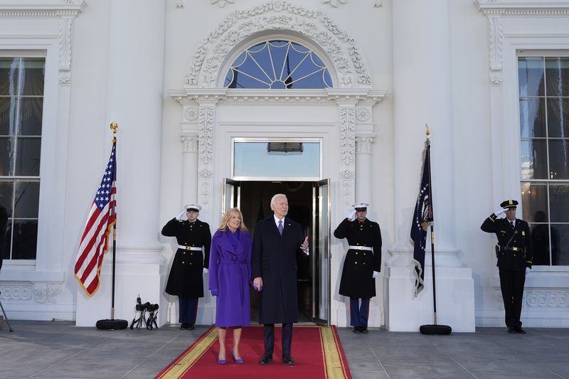 President Joe Biden and first lady Jill Biden walk out to greet President-elect Donald Trump and Melania Trump, as they arrive at the White House, Monday, Jan. 20, 2025, in Washington. (AP Photo/Alex Brandon)