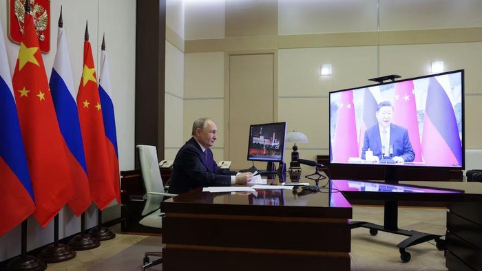Russian President Vladimir Putin holds a video conference meeting with Chinese President Xi Jinping at the Novo-Ogaryovo state residence outside Moscow, Russia January 21, 2025. Sputnik/Gavriil Grigorov/Pool via REUTERS Purchase Licensing Rights
