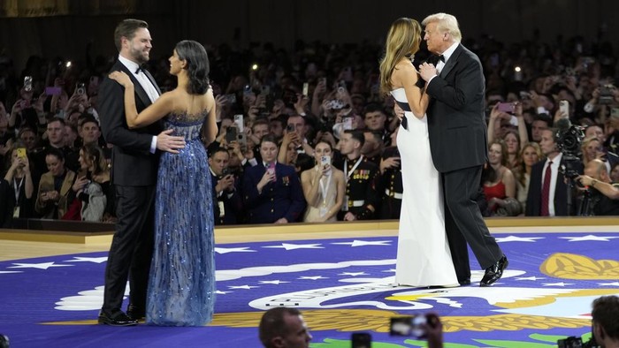 President Donald Trump, from right, with first lady Melania Trump and Vice President JD Vance, from left, with his wife Usha Vance, dance at the Commander in Chief Ball, Monday, Jan. 20, 2025, in Washington, during the 60th Presidential Inauguration. (AP Photo/Ben Curtis)