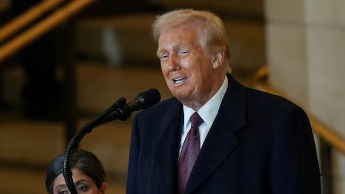 President Donald Trump delivers remarks in Emancipation Hall during inauguration ceremonies at the U.S. Capitol in Washington, on Jan. 20, 2025. Angelina Katsanis/Pool via REUTERS/File Photo Purchase Licensing Rights