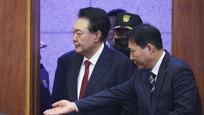 Impeached South Korean President Yoon Suk Yeol attends his impeachment trial at the Constitutional Court in Seoul, South Korea, Tuesday, Jan. 21, 2025. (Kim Hong-Ji/Pool Photo via AP)