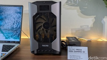Tecno turut memamerkan Mega Mini Gaming G1, mini PC terkecil di dunia dengan sistem pendingin yang menggunakan air. Lagi-lagi mereka tidak mengungkap ketersediaan perangkat ini di Indonesia. Foto: Virgina Maulita Putri/detikINET