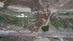 Foto Udara Perbaikan Tanggul Sungai Jebol di Demak