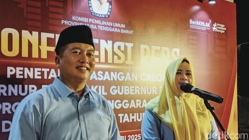 Lalu Muhamad Iqbal dan Indah Dhamayanti Putri saat ditetapkan menjadi pasangan gubernur terpilih oleh KPU NTB. Foto: (Ahmad Viqi/detikBali).