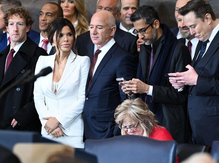 WASHINGTON, DC - JANUARY 20: (L-R) Priscilla Chan, Meta CEO Mark Zuckerberg, Lauren Sanchez, and businessman Jeff Bezos, among other dignitaries, attend the United States Capitol on January 20, 2025 in Washington, DC. Donald Trump takes office for his second term as the 47th President of the United States.   Shawn Thew-Pool/Getty Images/AFP (Photo by POOL / GETTY IMAGES NORTH AMERICA / Getty Images via AFP)