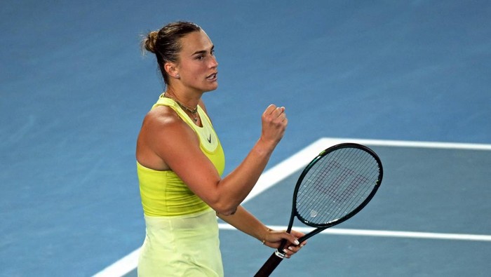 Tennis - Australian Open - Melbourne Park, Melbourne, Australia - January 23, 2025 Belarus Aryna Sabalenka reacts during her semi final match against Spains Paula Badosa REUTERS/Jaimi Joy