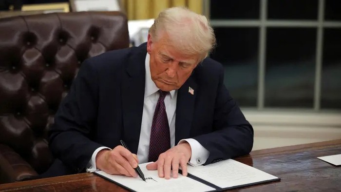 President Donald Trump signs documents at the White House on Inauguration Day, Jan. 20, 2025. (Reuters)
