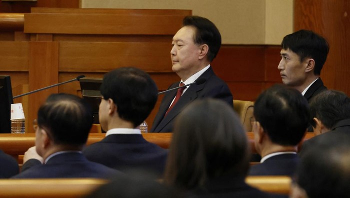 South Korea’s impeached President Yoon Suk Yeol arrives to attend the fourth hearing of his impeachment trial over his short-lived imposition of martial law at the Constitutional Court in Seoul, South Korea, 23 January 2025.    JEON HEON-KYUN/Pool via REUTERS