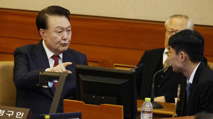 South Korea’s impeached President Yoon Suk Yeol arrives to attend the fourth hearing of his impeachment trial over his short-lived imposition of martial law at the Constitutional Court in Seoul, South Korea, 23 January 2025. JEON HEON-KYUN/Pool via REUTERS