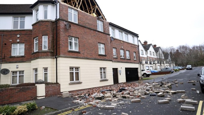 Parts of a wall of a house have fallen down caused by the winds of storm Eowyn that hit the country in Belfast, Northern Ireland, Friday, Jan. 24, 2025.(AP Photo)