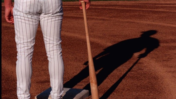 For cover of baseball section - Twins illustration  -- Minnesota Twins at spring training - illustration for cover of the Baseball Section...a lone baseball player on the field at sunset.(Photo By JUDY GRIESEDIECK/Star Tribune via Getty Images)