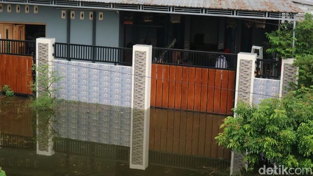 Kondisi banjir di Desa Pasuruan Lor, Kecamatan Jati, Kabupaten Kudus, Jumat (24/1/2025).