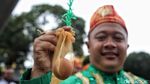 Meriahnya Kirab Budaya Telok Tamat di TMII