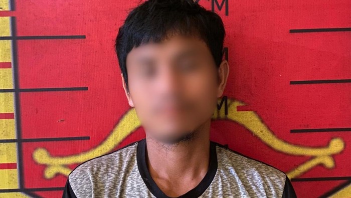 Pelaku SN saat diamankan di kantor polisi. (Foto: Dok. Polres Nisel)