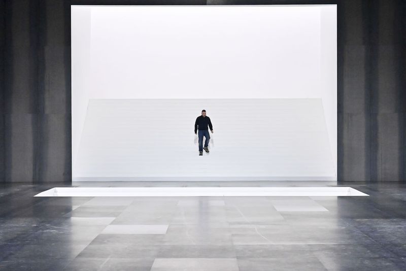 PARIS, FRANCE - JANUARY 24: A model walks the runway during the Dior Homme Ready to Wear Fall/Winter 2025-2026 fashion show as part of the Paris Men Fashion Week on January 24, 2025 in Paris, France. (Photo by Victor VIRGILE/Gamma-Rapho via Getty Images)