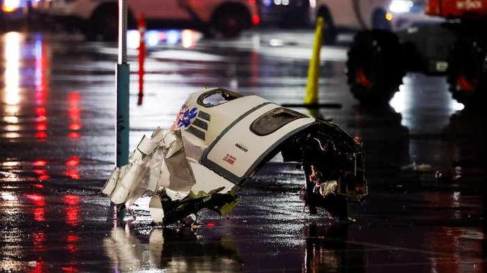 Debris of the aircraft lies on the ground at the site of a plane crash in Philadelphia, Pennsylvania, U.S., January 31, 2025. REUTERS/Rachel Wisniewski Purchase Licensing Rights