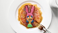 Pancake polos berwarna cokelat ini dijadikan kanvas oleh Sarah. Ia membuat sosok Bobs Burgers dengan meses warna-warni. Foto: Sarah Rosado/Bored Panda