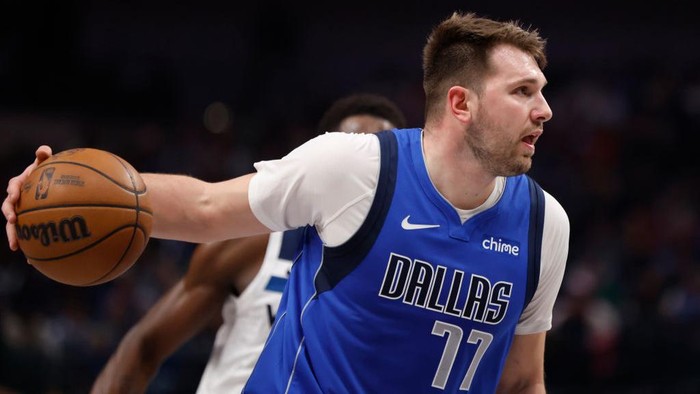 DALLAS, TX -DECEMBER 25 : Luka Doncic #77 of the Dallas Mavericks drives inside against the Minnesota Timberwolves in the first half at American Airlines Center on December 25, 2024 in Dallas, Texas. NOTE TO USER: User expressly acknowledges and agrees that, by downloading and or using this photograph, User is consenting to the terms and conditions of the Getty Images License Agreement. (Photo by Ron Jenkins/Getty Images)