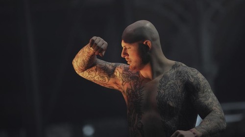 A man with a tattoo on his chest takes part in a contest during a tattoo convention, in Paris, Sunday, Feb. 2, 2025. (AP Photo/Thibault Camus)
