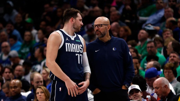 DALLAS, TX - MARCH 17: Luka Doncic #77 of the Dallas Mavericks and head coach Jason Kidd talk on  as the Mavericks take on the Denver Nuggets in the second half at American Airlines Center on March 17, 2024 in Dallas, Texas. NOTE TO USER: User expressly acknowledges and agrees that, by downloading and or using this photograph, User is consenting to the terms and conditions of the Getty Images License Agreement. (Photo by Ron Jenkins/Getty Images)