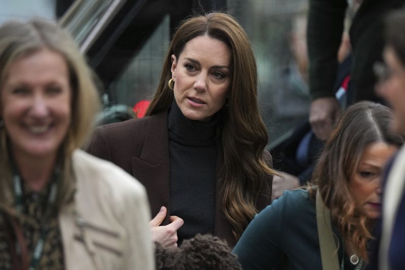 Britain's Kate, the Princess of Wales joins a group of four and five-year-old school children at the National Portrait Gallery as she launched a new project from The Royal Foundation Centre for Early Childhood aimed at supporting young children in the development of crucial social and emotional skills, in London, Tuesday Feb. 4, 2025. (Arthur Edwards/Pool Photo via AP)