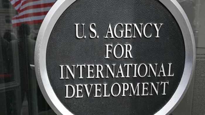 Signage is seen near the entrance to the headquarters of the United States Agency for International Development (USAID), before Congressional Democrats hold news conference in Washington, DC, on February 3, 2025. US Secretary of State Marco Rubio said Monday he had been put in charge of the US aid agency, saying he would stop its insubordination to President Donald Trumps agenda. After Trumps billionaire friend and advisor Elon Musk vowed to destroy the US Agency for International Development (USAID), whose website went dark over the weekend, Rubio confirmed he and the State Department had assumed control of the autonomous body. (Photo by Mandel NGAN / AFP)
