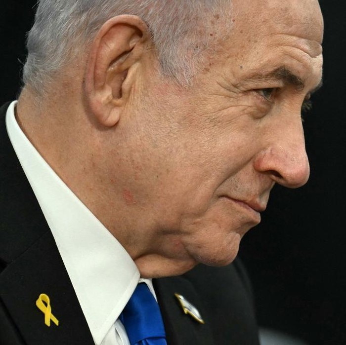 Israeli Prime Minister Benjamin Netanyahu looks on during a meeting with US Secretary of Defense Pete Hegseth (out of frame) at the Pentagon in Arlington, Virginia, on February 5, 2025. (Photo by Jim WATSON / AFP)
