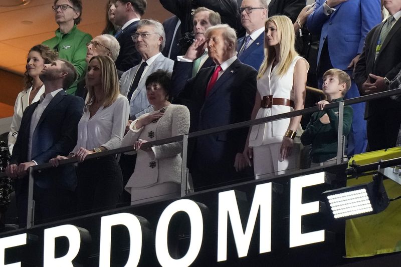 Eric Trump, from left, Lara Trump, New Orleans Saints owner Gayle Benson, President Donald Trump, his daughter Ivanka Trump and Ivanka Trump's son Theodore watch from a suite prior to the NFL Super Bowl 59 football game between the Philadelphia Eagles and the Kansas City Chiefs, Sunday, Feb. 9, 2025, in New Orleans. (AP Photo/Frank Franklin II)