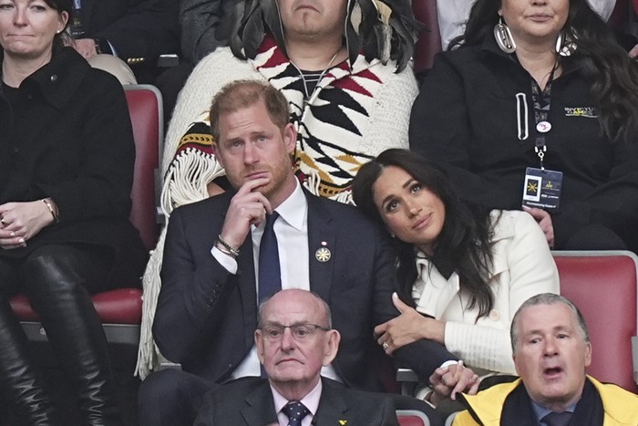Britains Prince Harry and Meghan Markle, the Duke and Duchess of Sussex, attend the opening ceremony of the 2025 Invictus Games in Vancouver, Canada, Saturday, Feb. 8, 2025. (Aaron Chown/PA via AP)