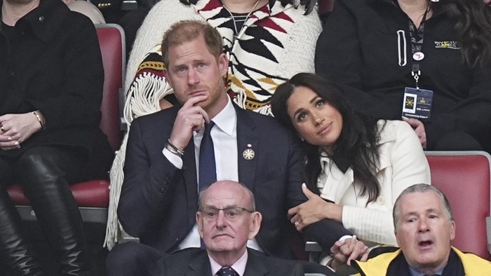 Britains Prince Harry and Meghan Markle, the Duke and Duchess of Sussex, attend the opening ceremony of the 2025 Invictus Games in Vancouver, Canada, Saturday, Feb. 8, 2025. (Aaron Chown/PA via AP)