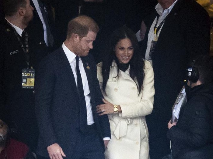 Britains Prince Harry and Meghan Markle, the Duke and Duchess of Sussex, attend the opening ceremony of the 2025 Invictus Games in Vancouver, Canada, Saturday, Feb. 8, 2025. (Aaron Chown/PA via AP)