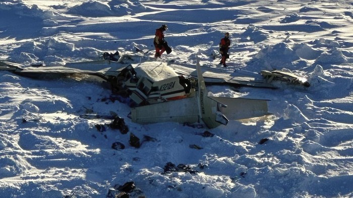 This photo provided by the U.S. Coast Guard on Friday, Feb. 7, 2025, shows a small commuter plane that crashed in western Alaska on a flight that was bound for the hub community of Nome. (U.S. Coast Guard via AP)