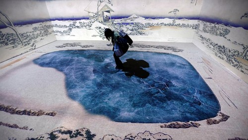 A visitor attends an exhibition that uses cutting-edge technology to bring to life the work of iconic samurai-era ukiyo-e artist Katsushika Hokusai at 'HOKUSAI: ANOTHER STORY in TOKYO', technical wizardry from Sony PCL Inc. and Ars Techne Corp, and the woodblock prints provided by the Yamanashi Prefectural Museum that owns the original work, during a preview event in Tokyo, Japan January 30, 2025.  REUTERS/Issei Kato
