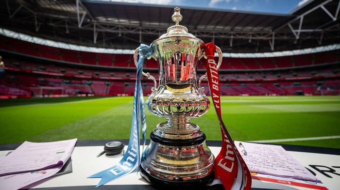 LONDON, ENGLAND - MAY 25: A detailed view of the Emirates FA Cup trophy on a plinth on the inside of the stadium prior to the  Emirates FA Cup Final match between Manchester City and Manchester United at Wembley Stadium on May 25, 2024 in London, England. (Photo by Ash Donelon/Manchester United via Getty Images)