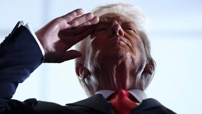 US President Donald Trump salutes before the NFL Super Bowl LIX - Philadelphia Eagles v Kansas City Chiefs. (Reuters)